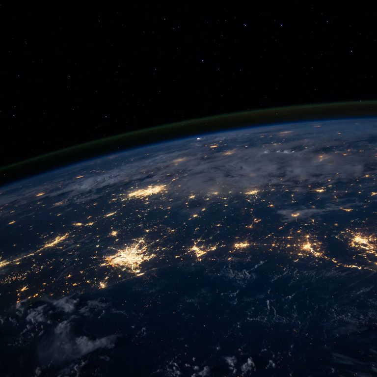 an image of the earth at night with bright city lights